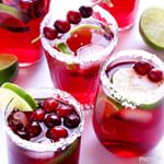 #Wedding Drink Ideas: Cranberry Margaritas - get this recipe and more on our blog. Cheers! #diywedding #cocktails #bridetobe #engaged #signaturedrinks